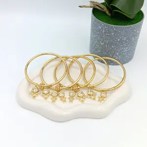 Brazalete with charms, personalized pulses with boy and girl, 14K high quality gold plates.