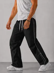 Men Lightweight Track Pants Comfortable Straight Leg Drawstring Windbreaker Trousers Contrast Side Piping For Festival Entry Lines Stadium Concourse Travel Days Campus Walk Breathable Matte Shell Wide Leg Movement Sneaker Friendly Hem