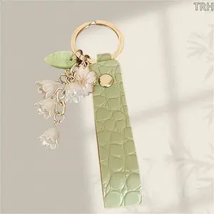 Green Faux Leather Strap Keychain, Lily of the Valley & Cherry Blossom Floral Bag Charm, Cottagecore Dainty Purse Accessory, Sweet Birthday Gift for Women for Daily Handbag & Car Key Decor