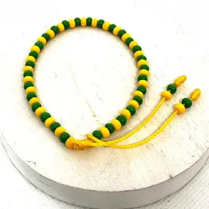 Orula Pulso idde de Orula Yellow and Green Beaded Bracelet with Yellow String
