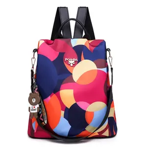 Color-blocked geometric print backpack, women's waterproof Oxford cloth large capacity student school bag, stylish and versatile travel bag.