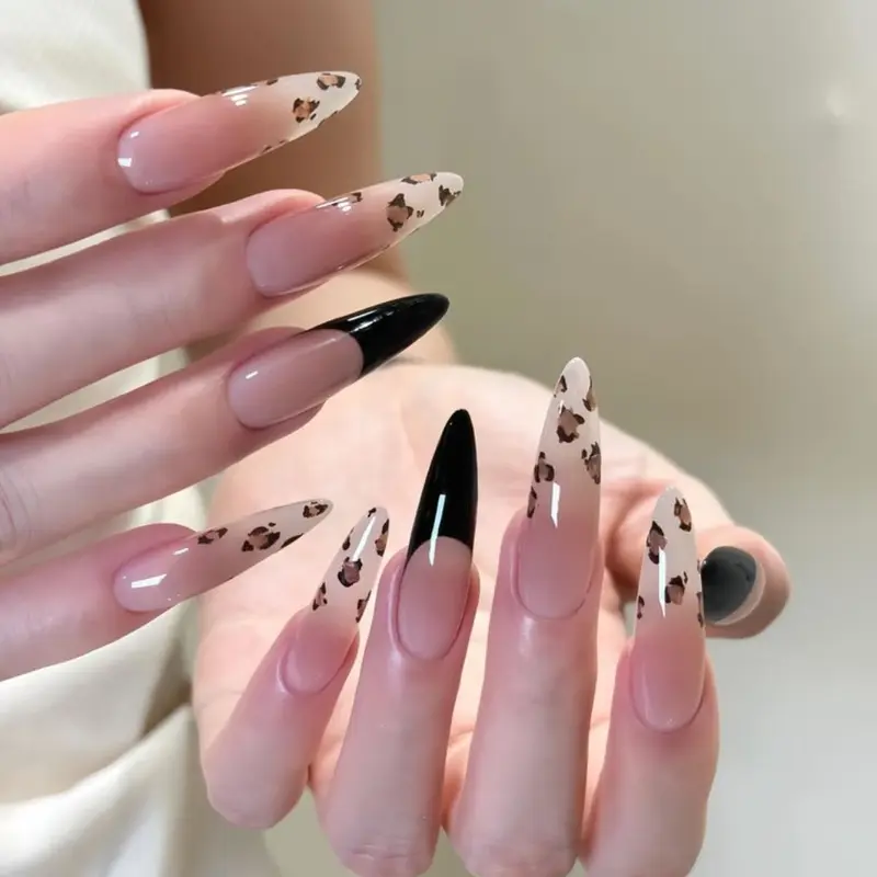 Leopard French Tip Nail Box, nude pink stiletto nails with black French tips and subtle leopard print accents, premium ABS gel material, reusable, fit for women, ideal gift for birthdays or fashion lovers