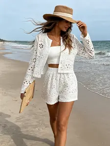 Two piece women's fashionable white hollow embroidery jacket and shorts set, with fresh and breathable hollow embroidery. The short version looks tall and slim, making it easy to wear for commuting and shopping