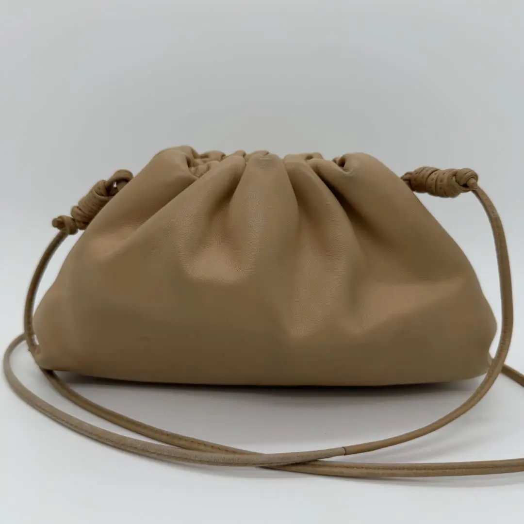 Pre-owned BOTTEGA VENETA The Mini Pouch Leather Clutch (Buttercream/Beige)