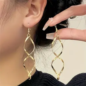 Bold Twist Wave Dangle Earrings - Chic Minimalist Design for Women, Perfect for Casual & Party Wear Modern Twist Dangle Earrings - Simple Yet Bold Statement Earrings for Everyday Fashion & Nights Out