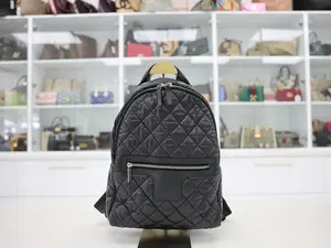 Pre-owned CHANEL QUILTED NYLON Backpacks COCOON BLACKPACK
