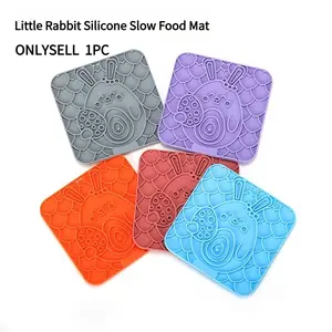 Silicone suction cup pet licking pad with rabbit pattern anti choking, slow eating, stress relieving, Christmas tree style cat and dog universal licking plate