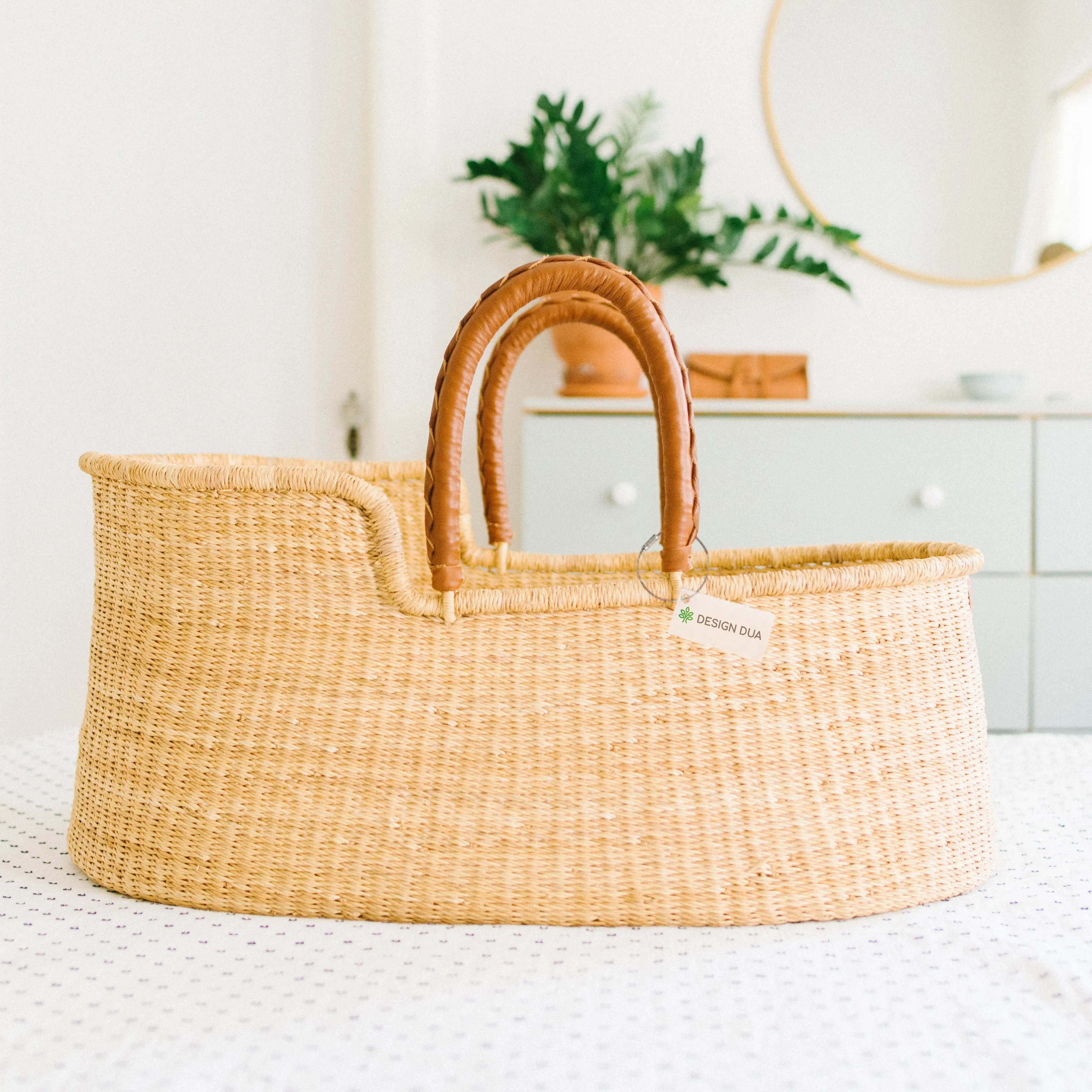Signature Bilia Bassinet: Natural Finish with Tan Leather Handles, Handmade, Safe for Sleep, Eco-Friendly, Includes Fitted Foam Pad, US Safety Tested, Sustainable Moses Basket Crafted from Natural Elephant Grass, Bedside bassinet