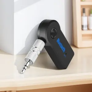 Wireless Bluetooth 5.0 Car Adapter with Microphone, AUX Receiver for Hands-Free Calling & Music Streaming, Plug & Play, Compatible with Smartphones and Tablets, Universal Car Audio Upgrade, Crystal Clear Sound.