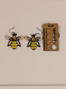 Hand painted bumblebee earrings.