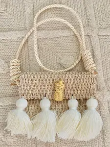 Woven palm bag “Carriel”