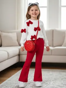 This Charming Chic Kids White Ribbed Sweater with Unique 3D Red Bows & Eye-catching Red Flared Trousers Outfit is Picture-Perfect Ideal for Holiday Photo Shoots Special Occasions or a Stylish Fall/Winter Wardrobe Comfy & Cute Toddler Girl FashionStatement