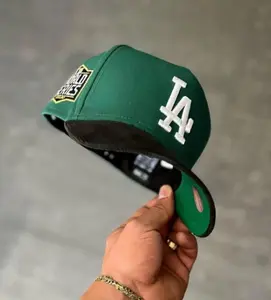 Los Angeles Dodgers New Era 9FORTY Snapback Baseball Cap – Dark Green Flat Brim Hat with White LA Logo & Anniversary Side Patch, MLB Streetwear Headwear