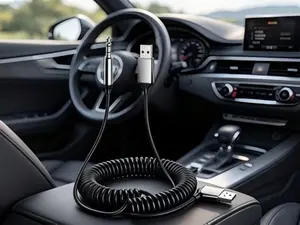 Bluetooth audio receiver with 3.5mm interface, built-in microphone for hands-free calling. Plug-and-play design connects with car stereos and home audio systems for wireless audio playback.