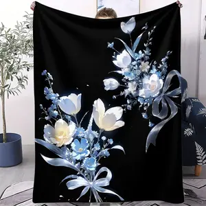 White and Blue Floral Print Flannel Blanket With Black Backing and Blue and White Watercolor Floral and Bow Pattern Is Soft and Cozy For All Seasons