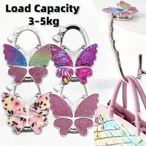 Supports 3-5kg weight capacity Butterfly Foldable Handbag Hanger,Folding Purse Table Hook Holder,Foldable Purse Hook,Purse Holder Stand for Table Multifunction Table Side Hanger Portable Women Purse Handbag Hook Holder Fashion Accessories-MM