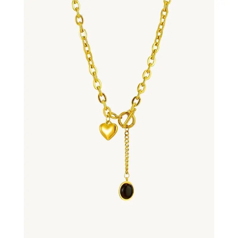 AVELI Stainless Steel Heart Black Stone Pendant Necklace with Toggle Lock - Yellow Gold Tone Trendy Jewelry for Women, Elegant Statement Piece, Hypoallergenic and Stylish Accessory