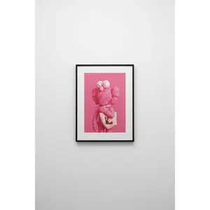 This is a pink KAWS character wall rug poster 21.5 X 32