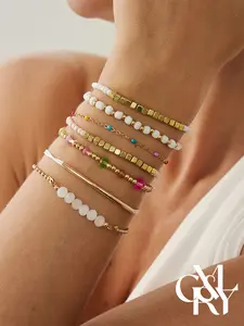 CYL&RY Boho Gold & White Beaded Bracelet Stack, 7Pcs Layered Multicolor Seed Beads, Lightweight & Tarnish Resistant, Perfect for Beach Vacations, Travel and Summer Styling, Trendy Stack Bangle