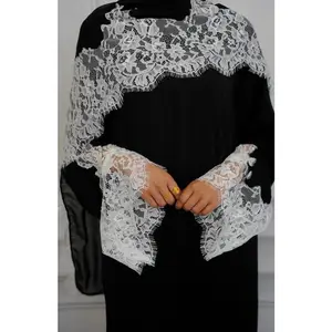 Maya Lace Abaya is a closed black abaya with soft white lace on the  sleeves. It has a flowy, modest fit and comes with a matching hijab. Simple, elegant, and perfect for any occasion.