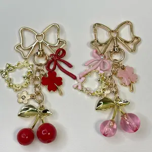 Cherry Blossom Butterfly Heart Clover Keychain Girly Bag Charm Kawaii Purse Accessory with Gold Bow and Red Pink Beads
