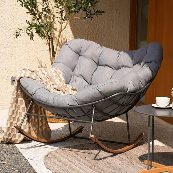 KVAYINE Large Patio Rocking Chair with Extra-Thick, Oversized Cushion—Ideal for patios and porches. 550-pound all-weather rocking chair, double-layered reinforced packaging for safe shipping.