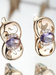 A pair of egg-shaped earrings made of synthetic purple zirconia are fashionable and simple, suitable for women to wear at travel wedding parties
