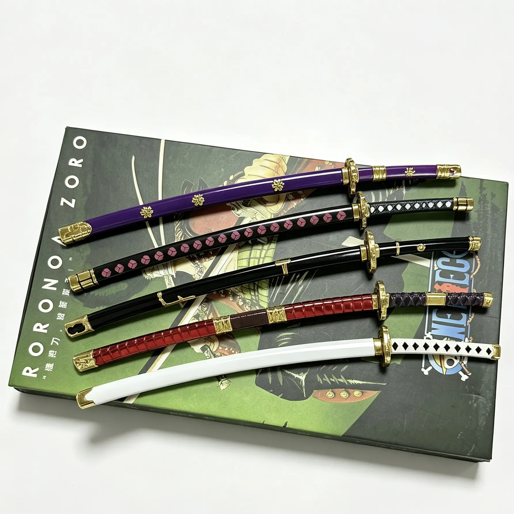 Anime merchandise related to “One Piece”: Zoro Five-Piece Set, Tiankui Guardian Ki, Red Sand Scorpion, Torajie Gravity Sword, Hawk-Eye Black Sword, Night Blade Statue, Keychain, Toy Models.