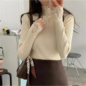 Women’s slim-fit knit top with lace trim and a mock turtleneck, new autumn–winter fashion design; indoor sweater