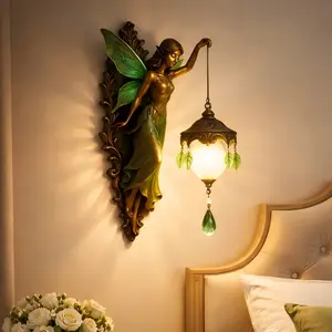 Whimsical home decor, vintage fairy sculpture wall lamp releases soft LED glow for residential wall layout