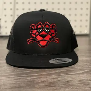 Red Panther Embroidered Trucker Hat.