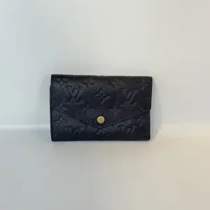 Pre-owned Louis Vuitton Leather Small Leather Goods Monogram Empreinte Black Compact Wallet Premium Leather, Snap Closure, Multiple Slots, Lightweight, Daily Use