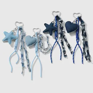 1 piece retro, stylish, versatile casual blue denim keychain/bag charm featuring stars, hearts, rhinestones, and faux pearls with woven cord; DIY; suitable for girls’ everyday wear and as a holiday gift.
