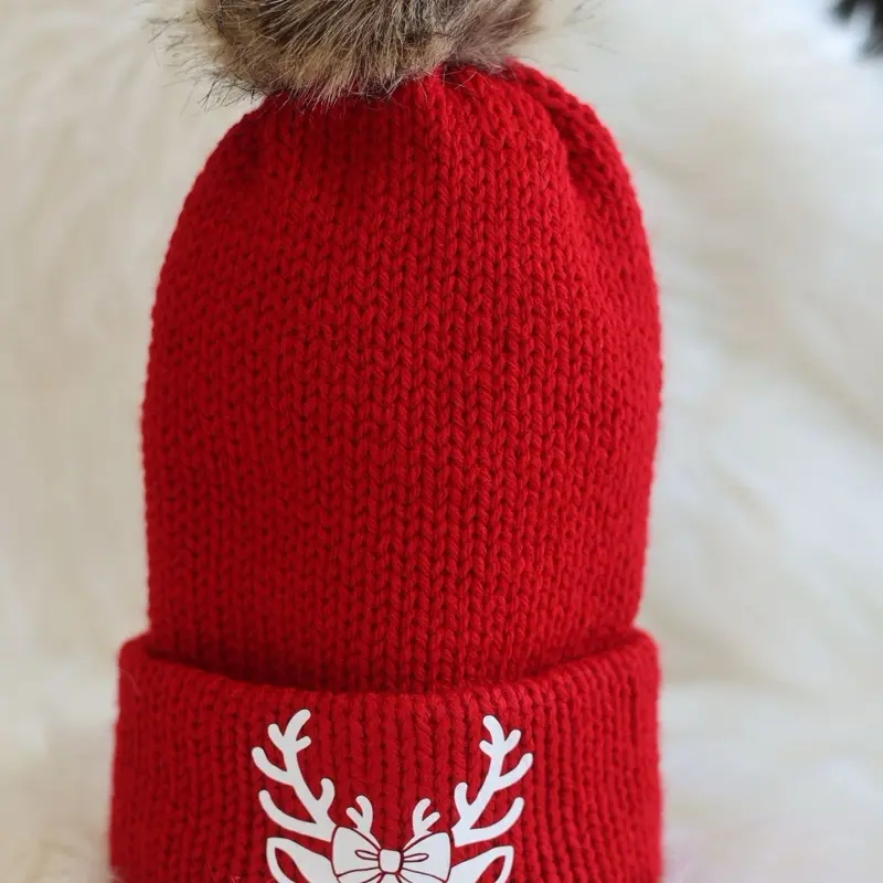 Adult Christmas Beanie with a Cute Reindeer Design Red Knit Hat Featuring a Pom Pom and Festive Bow Detail