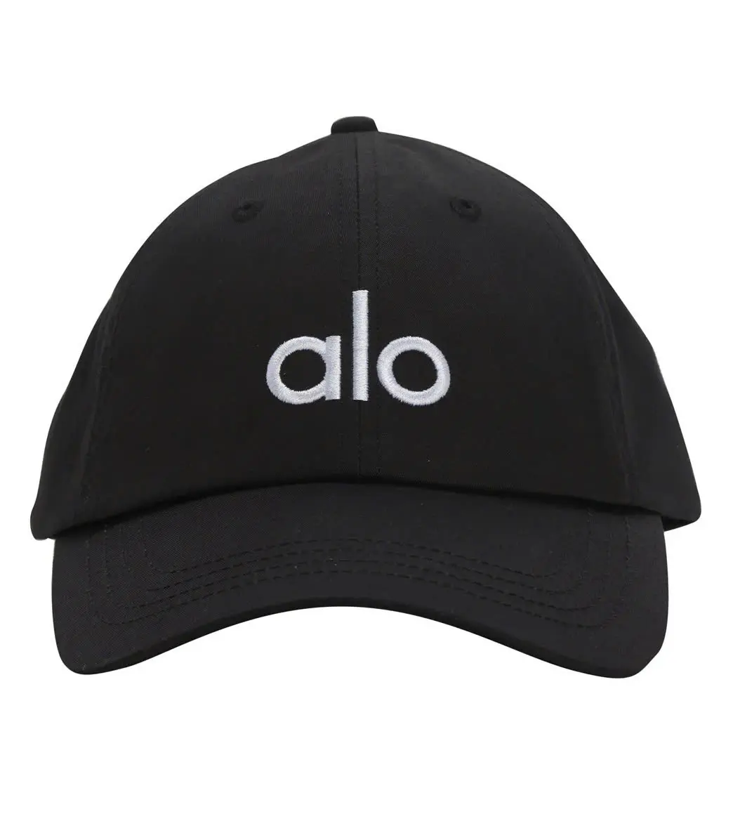 A Yoga Performance Off-Duty District Trucker Hat - Black Baseball Cap with White Letter Design, 100% Polyester, Sun Protection, Durable Woven, Minimalist Outdoor Headwear for Running & Activities