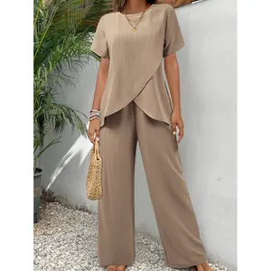 Women's two-piece set featuring a short-sleeve, loose-fitting, casual, crew-neck top and matching bottom with an asymmetrical hem; made from a linen-like fabric that is comfortable and breathable-perfect for summer vacations, leisure, and the beach.