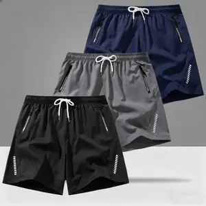Three stripe drawstring sports shorts, featuring a stylish athletic design with an adjustable elastic waistband, suitable for different waist sizes, easy to put on and off with a casual feel. Side zipper pockets are practical and add a design element. The