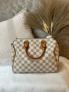 Pre-owned Louis Vuitton Speedy 25 in classic Damier Azur canvas, featuring natural leather top handles, polished gold tone hardware 1919H1180