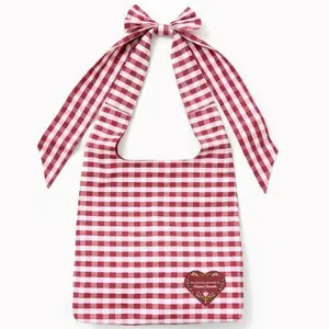 New autumn women's shoulder bag with bowknot under the armpit, fashionable and simple, with a trendy color block design, suitable for commuting, casual and stylish. Checkered single shoulder bag.