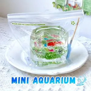 Handcrafted Mini Aquarium Stress Relief Toy, Soft And Squeezable, Slow Rising And Sticky, Perfect for Office, Christmas, Halloween, Easter, And Birthday Gifts, Fun Game Prank Pinching Toy, Desk Decoration