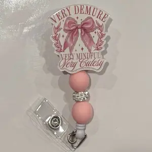 Very Demure Belt Clip Badge Reel with Pink Bow Design and Beaded Handle