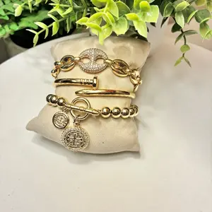 Shop The Look - 14k Gold Plated Bracelet Stack featuring pignose pave bracelet, ball and toggle bracelet and nail cuff bracelet