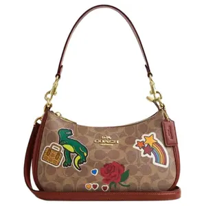 COACH Teri 24 Medium Shoulder Bag With Top Zipper Closure And Sticker Print Logo