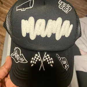 Junk Hat - Black Baseball Cap with "Mama" Lettering, "Let's Go" Text, and "Bomber" Design