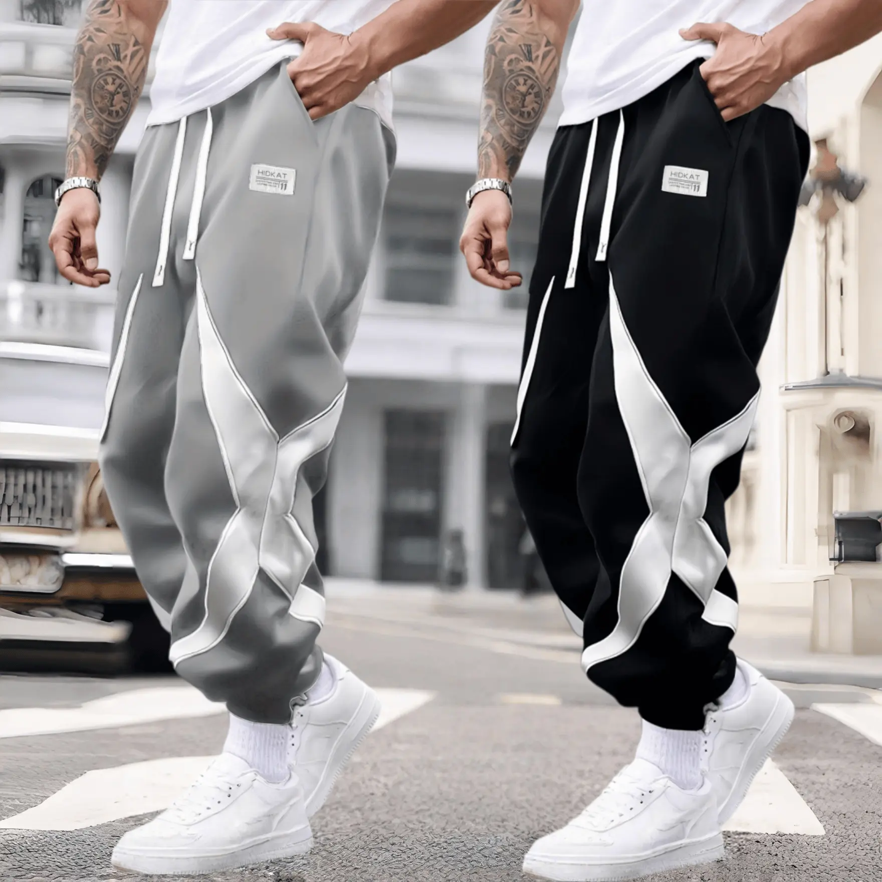 Plus-size men’s color-block jogging pants featuring a soft, elastic waistband and rolled cuffs; street-style athletic pants suitable for everyday workouts and casual wear. Wide-leg, loose fit sports pants with a comfortable elastic waistband and drawstrin