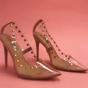 Elegant Transparent Studded Heels with Gold Studs and Pointed Toe Design for Stylish Outfits