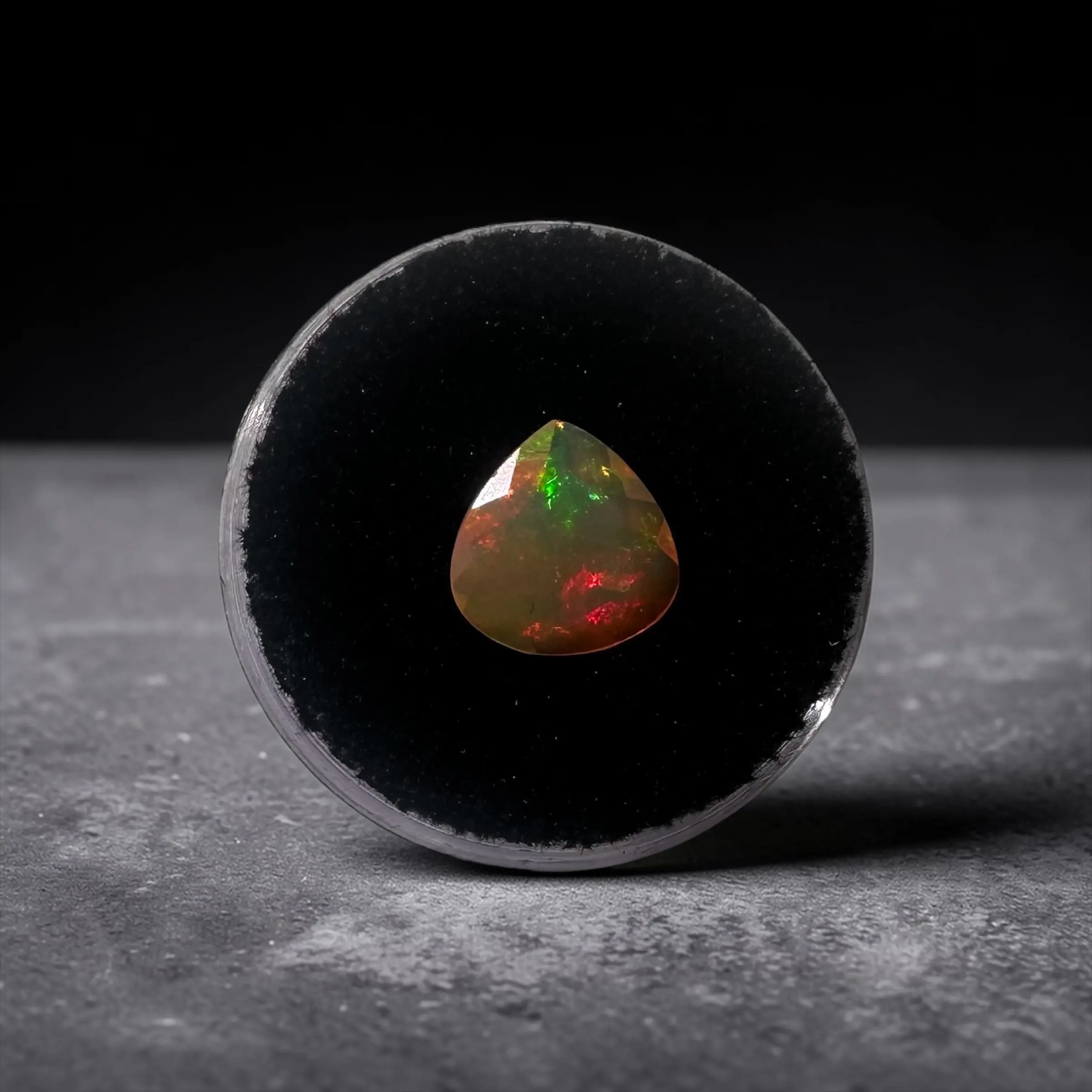1.36 ct Natural Ethiopian Welo Opal Gemstone | Faceted Pear, Red Green Fire