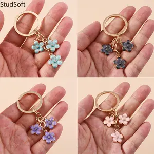 2026 New Sweet Cherry Blossom Keychain, Minimalist Flower Bag Charm for Women, Cute Sakura Pendant for Phone & Handbag