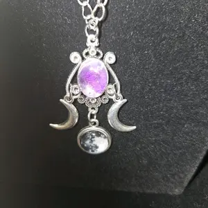 amethyst and clear quartz with tourmaline pendant