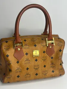 Pre-owned MCM Visetos monogram canvas with brown leather handles Boston vintage bag in cognac Visetos monogram canvas with brown leather handles